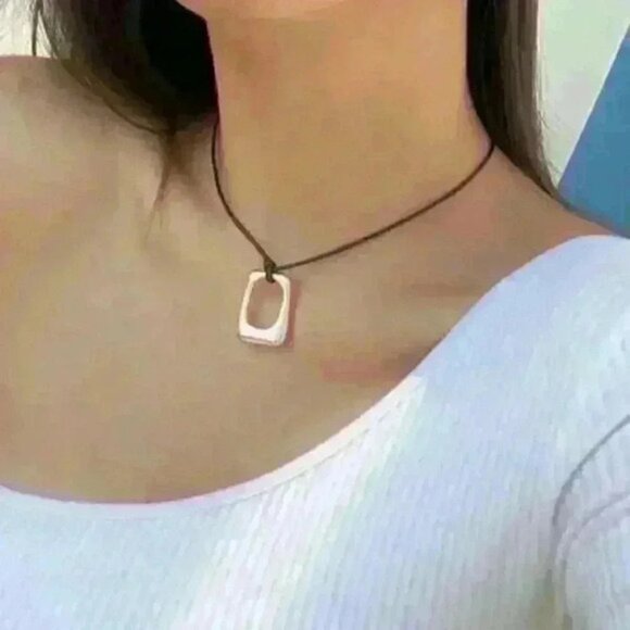 Jewelry - New Geometric Pendant Cord Necklace on a Black Cord